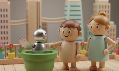 A joyful, curious 4-year-old boy with a round face and short brown hair reaches toward a small silver robot bird trapped behind a green-painted wooden flowerpot on a rooftop balcony; his mother, about 30 with tied-back hair and a kind smile, stands slightly back to the right with a hand on her hip, watching proudly as he helps the bird; the scene is tender and warm with pastel tones, visible wood textures, simple rounded shapes, soft lighting, and a futuristic cityscape of lacquered wooden mini skyscrapers and stylized floating bridges in the background.